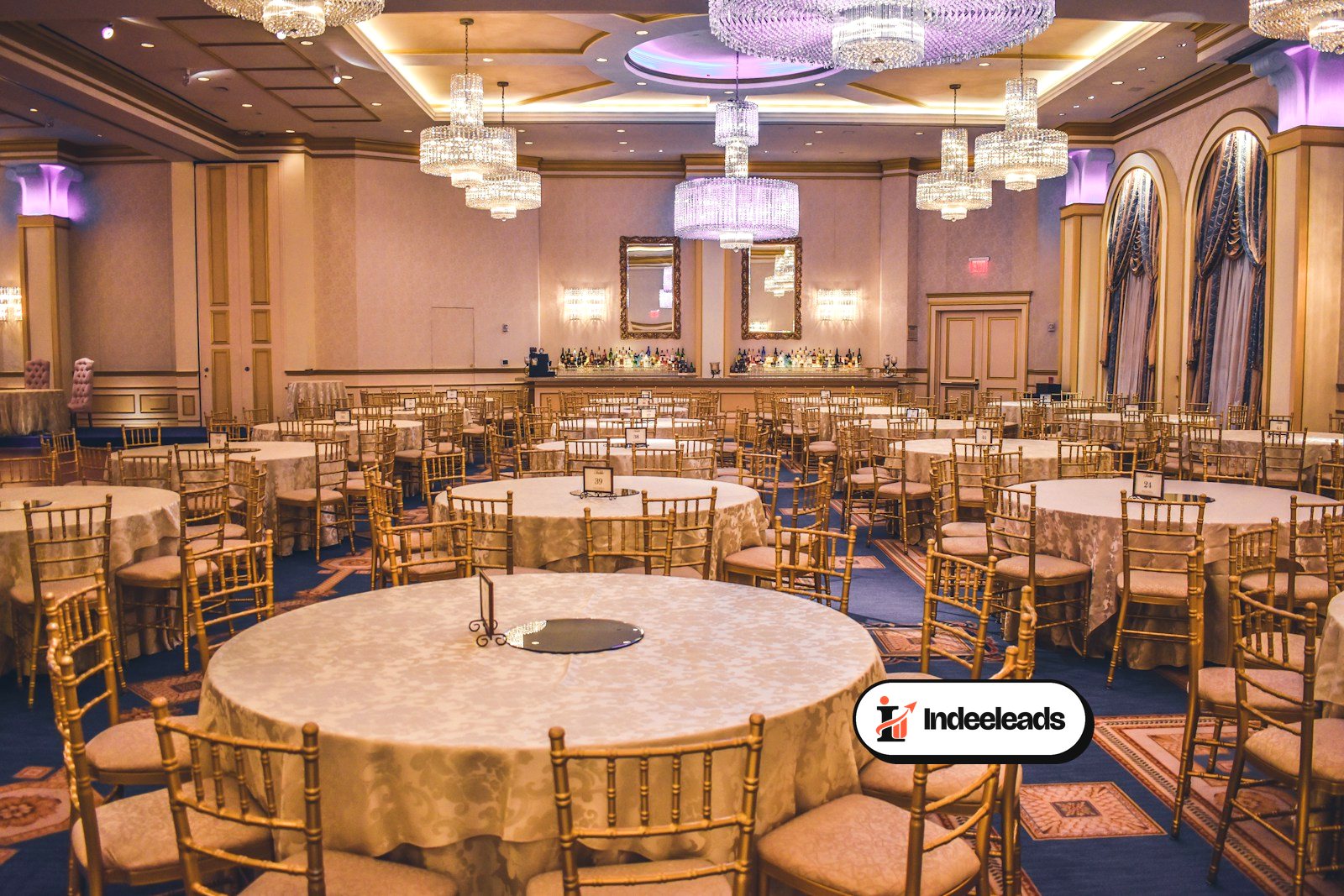 Banquet hall set with round tables for a wedding reception