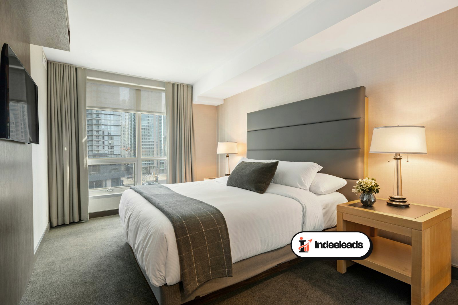 Modern city hotel room with a king-size bed