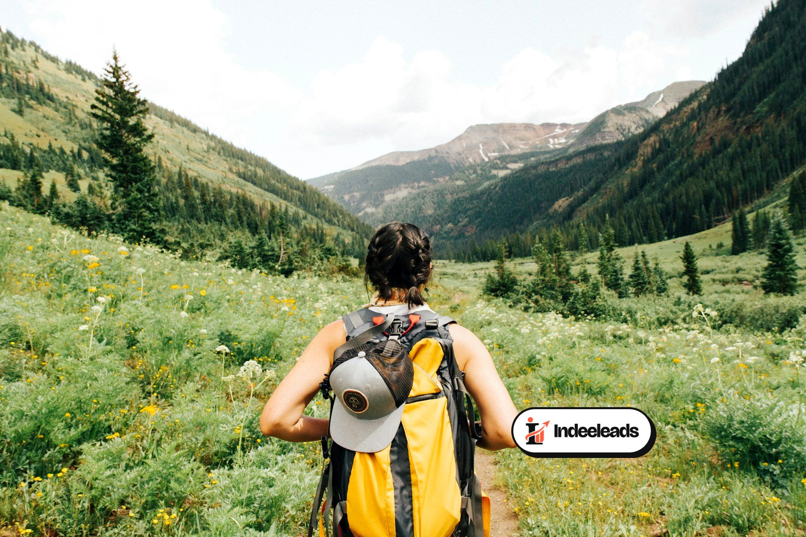 Hikers trekking through mountains on an adventure tour
