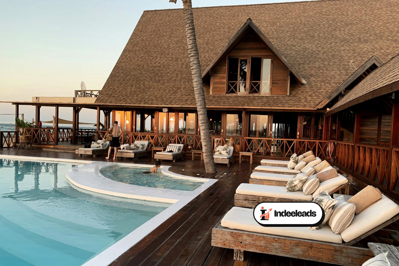 Luxury hotel resort with a swimming pool at dusk